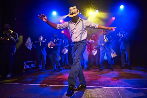 Integrantes da Unidos da Tijuca fazem uma apresentação em Zurique. Foto: AFP/MICHAEL BUHOLZER/