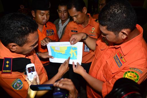 Integrantes das esquipes de resgate da Indonésia em Makassar, Sulawesi, em 30 de janeiro
Foto: AFP Jalin