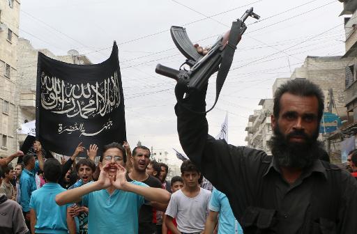 Apoiadores da frente al Nosra durante protesto, no dia 26 de setembro de 2014. Foto: AFP/Arquivos Fadi al-Halabi/