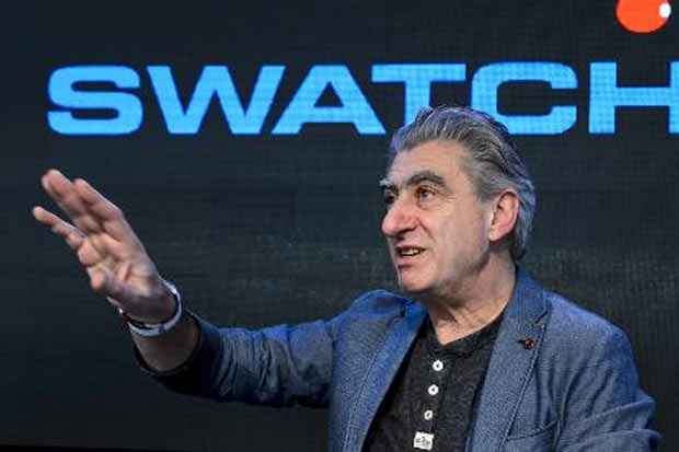 O diretor executivo do grupo relojoeiro Swatch, Nick Hayek, é visto em 12 de março de 2014. Foto: Fabrice Coffrini/AFP/