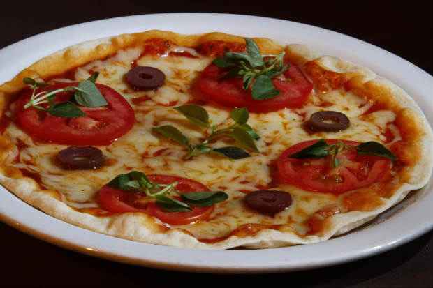 Cerca de 1,5 milhão de pizzas são consumidas diariamente no Brasil. Foto: Divulgação/ Cerca de 1,5 milhão de pizzas são consumidas diariamente no Brasil. Foto: Divulgação/