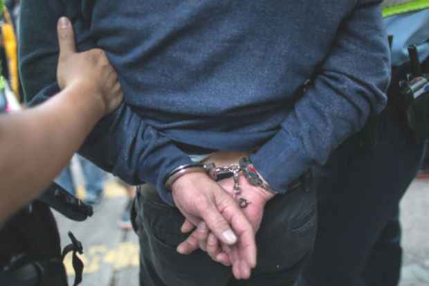 A tortura de suspeitos por parte da polícia é uma prática comum na China, denuncia a organização Anistia Internacional. Foto: AFP/Arquivos Anthony Wallace/ A tortura de suspeitos por parte da polícia é uma prática comum na China, denuncia a organização Anistia Internacional. Foto: AFP/Arquivos Anthony Wallace/