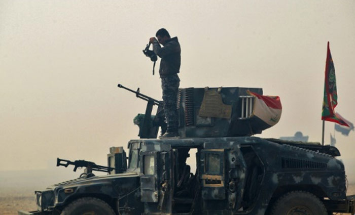 Combatentes iraquianos avan&ccedil;am na dire&ccedil;&atilde;o de Mossul. Foto: Ahmad Al-Rubaye/AFP/Arquivos/