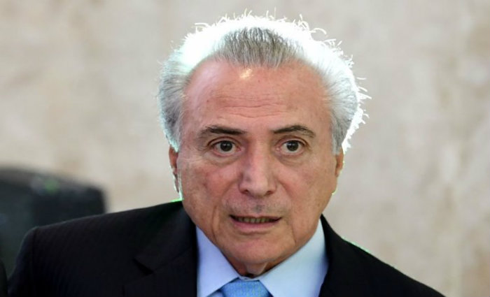 Nesta quarta-feira, ainda no Pal&aacute;cio do Jaburu, logo cedo, Temer e Moreira viram o in&iacute;cio da sess&atilde;o, mas, em seguida, foram para o Planalto. Foto: Evaristo Sa/AFP/