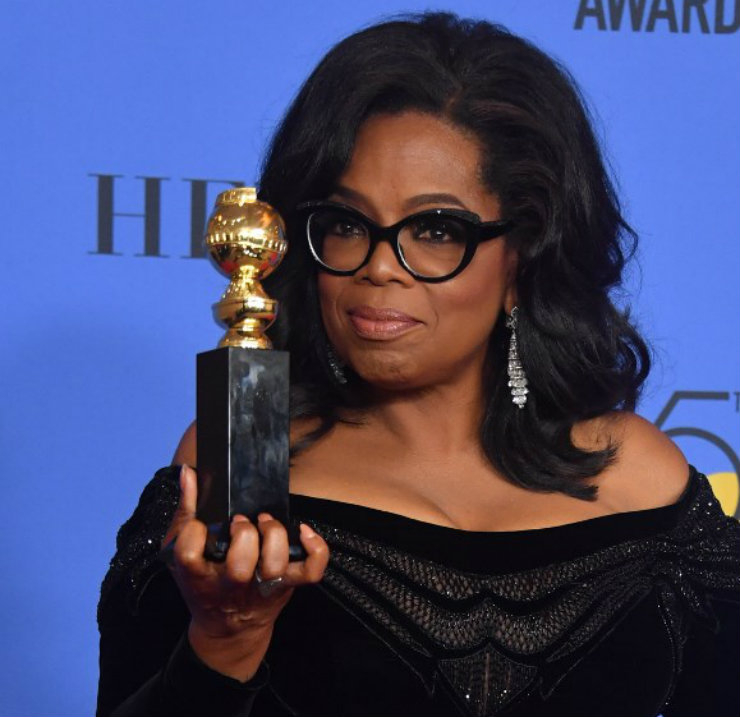 "Eu quero todas as garotas assistindo aqui, agora, saibam que um novo dia está no horizonte", disse Oprah Winfrey num dos discursos mais aclamados da noite, após ser homenageada no palco. Foto: AFP/Divulgação