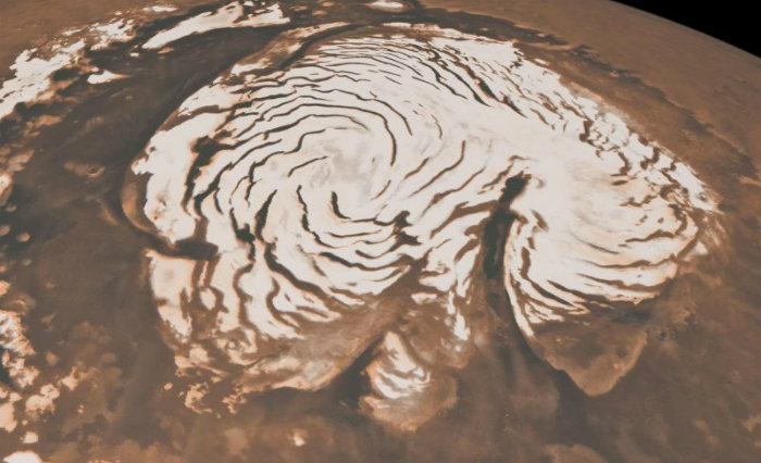 Gelo no polo norte de Marte: a análise de registros feitos pela sonda Mars Reconnaissance Orbiter permite traçar uma história do clima da região. Foto: AFP/Foto: AFP Gelo no polo norte de Marte: a análise de registros feitos pela sonda Mars Reconnaissance Orbiter permite traçar uma história do clima da região. Foto: AFP/Foto: AFP