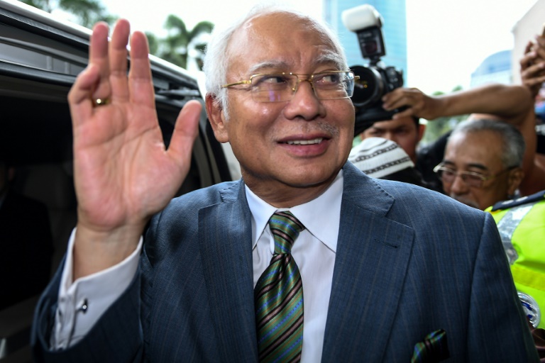 Razak deixa o tribunal de Kuala Lumpur. Foto: AFP / Mohd RASFAN/ Razak deixa o tribunal de Kuala Lumpur. Foto: AFP / Mohd RASFAN/