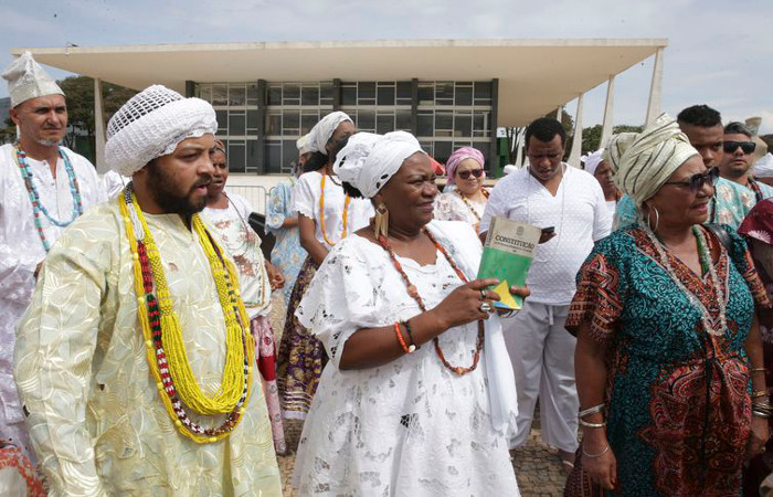 Praticantes de religiões de matriz africana aguardam o início do julgamento, no STF. Foto: Antonio Cruz/Agência Brasil/