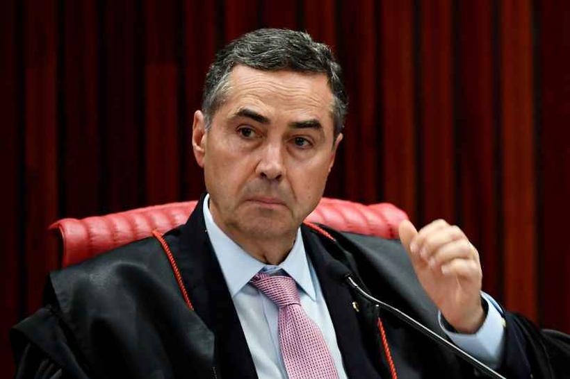 Para Barroso, um eventual descumprimento à determinação estabelecida pelo plenário do TSE "deverá ser analisado, caso a caso, pelos juízes auxiliares deste tribunal". Foto: Evaristo Sá/AFP () Para Barroso, um eventual descumprimento à determinação estabelecida pelo plenário do TSE "deverá ser analisado, caso a caso, pelos juízes auxiliares deste tribunal". Foto: Evaristo Sá/AFP/