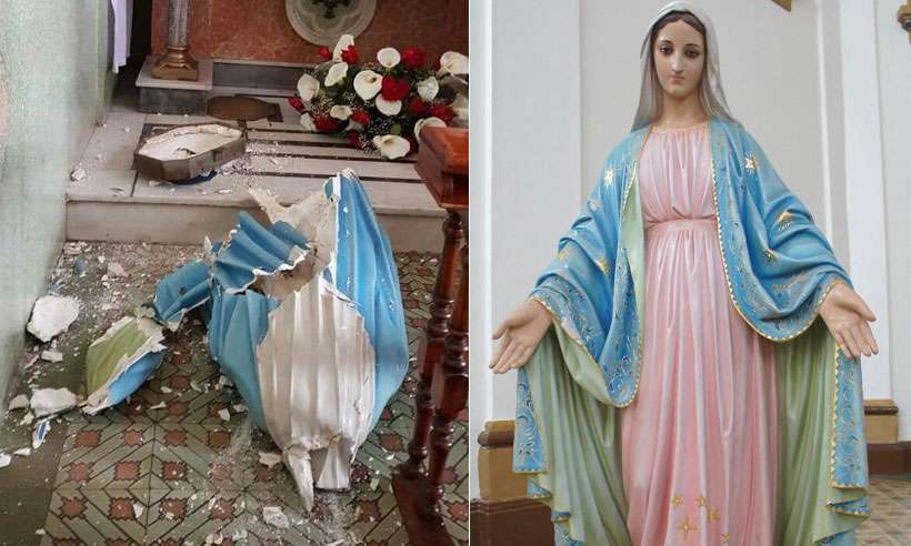 Imagem de Nossa Senhora das Graças ficou em cacos ao ser puxada por um jovem que entrou na Igreja de São Sebastião, em Conselheiro Lafaiete. Foto: Reprodução da internet/Facebook/ Imagem de Nossa Senhora das Graças ficou em cacos ao ser puxada por um jovem que entrou na Igreja de São Sebastião, em Conselheiro Lafaiete. Foto: Reprodução da internet/Facebook/