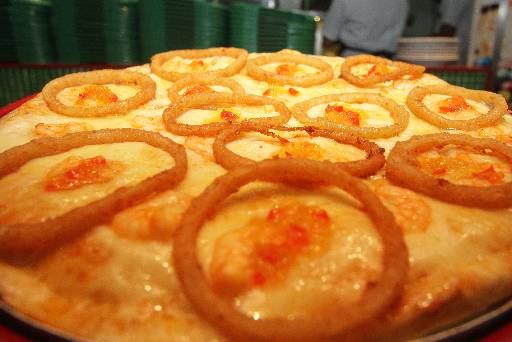 Pizza entrou no menu por acaso e se tornou o carro-chefe do cardápio. Foto: Nando Chiappetta/DP FOTO