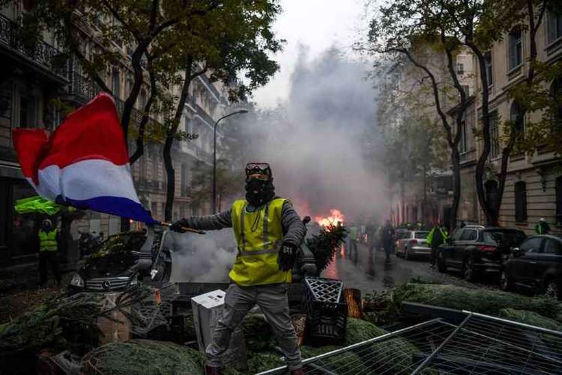 Por três fins de semana, os coletes amarelos promoveram manifestações que eclodiram há quatro dias. Foto: Alain JOCARD / AFP/ Por três fins de semana, os coletes amarelos promoveram manifestações que eclodiram há quatro dias. Foto: Alain JOCARD / AFP/