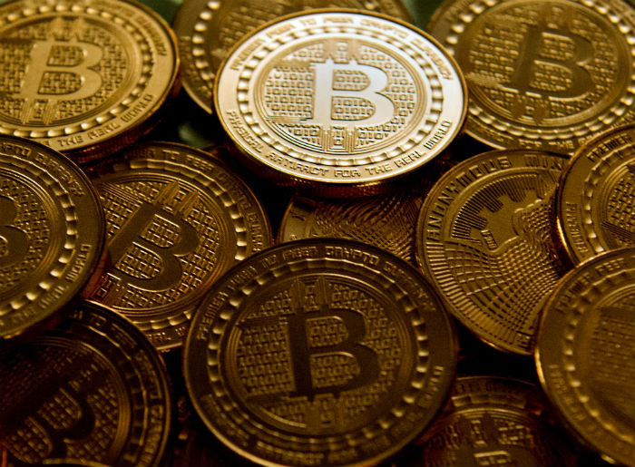 O bitcoin foi a primeira criptomoeda criada. Foto: Karen Bleier/AFP./ O bitcoin foi a primeira criptomoeda criada. Foto: Karen Bleier/AFP./