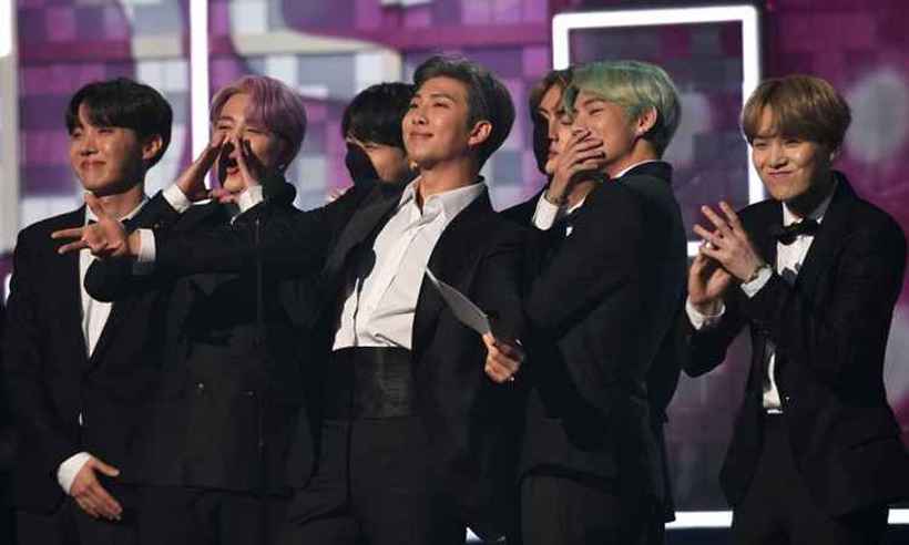 Grupo BTS gerou US$ 3,6 bilhões à Coreia do Sul em 2018. Foto: ROBYN BECK/ Grupo BTS gerou US$ 3,6 bilhões à Coreia do Sul em 2018. Foto: ROBYN BECK/
