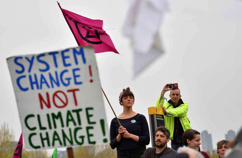 O movimento anunciou, dentro de sua 'rebelião internacional', protestos em 80 cidades de 30 países, até 22 de abril. Foto: BEN STANSALL / AFP/ O movimento anunciou, dentro de sua 'rebelião internacional', protestos em 80 cidades de 30 países, até 22 de abril. Foto: BEN STANSALL / AFP/