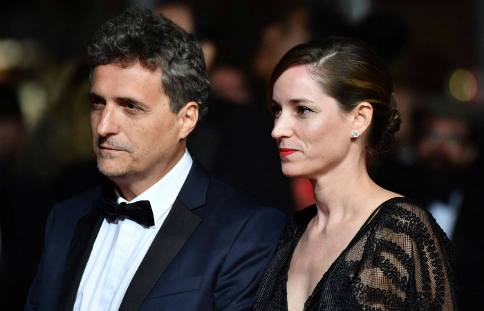O diretor Kleber Mendonça Filho e a produtora francesa Emilie Lesclaux chegam para a exibição de Bacurau. Foto: Alberto Pizzoli/AFP/ O diretor Kleber Mendonça Filho e a produtora francesa Emilie Lesclaux chegam para a exibição de Bacurau. Foto: Alberto Pizzoli/AFP/