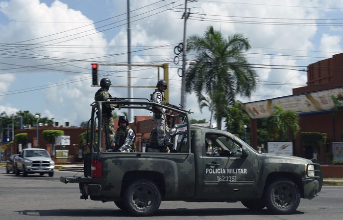 Homens fortemente armados travaram uma batalha campal na véspera contra as forças de segurança mexicanas que realizavam uma operação fracassada para capturar Guzmán - Foto: ALFREDO ESTRELLA / AFP./ Homens fortemente armados travaram uma batalha campal na véspera contra as forças de segurança mexicanas que realizavam uma operação fracassada para capturar Guzmán - Foto: ALFREDO ESTRELLA / AFP./