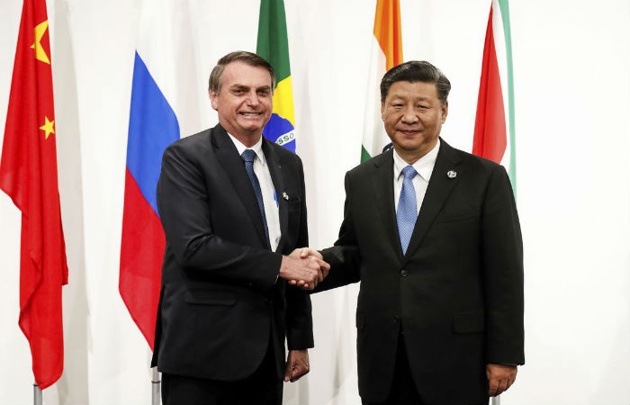 Pequim também sinalizou com uma expansão do crédito por meio de seus bancos no Brasil/o presidente Jair Bolsonaro e o presidente da China, Xi Jinping. Foto: Alan Santos/PR