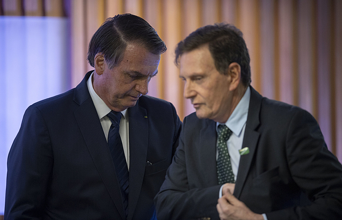 No Rio, Crivella, o escolhido do presidente disputará o segundo turno com Eduardo Paes (DEM). Já no Recife, a aliada, Delegada Patrícia, ficou em quarto lugar/Foto: Mauro Pimentel/AFP No Rio, Crivella, o escolhido do presidente disputará o segundo turno com Eduardo Paes (DEM). Já no Recife, a aliada, Delegada Patrícia, ficou em quarto lugar/Foto: Mauro Pimentel/AFP