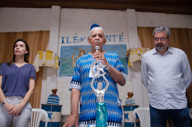 Renata Borba, Manoel Papai (babalorixá do Sítio do Pai Adão) e Gilberto Freyre Neto em 2019/Foto: Jan Ribeiro/Secult-PE/Fundarpe Renata Borba, Manoel Papai (babalorixá do Sítio do Pai Adão) e Gilberto Freyre Neto em 2019/Foto: Jan Ribeiro/Secult-PE/Fundarpe