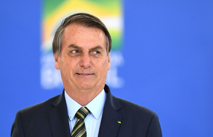 Mandatário, contudo, distorceu a fala da chanceler alemã, que relatou que o ato deveu-se ao pouco tempo de implementação das medidas restritivas/Foto: Evaristo Sá/AFP