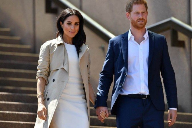 Em entrevista a Oprah, Meghan Markle disse que se casou com Harry reservadamente dias antes da cerimônia oficial/Foto: SAEED KHAN / AFP Em entrevista a Oprah, Meghan Markle disse que se casou com Harry reservadamente dias antes da cerimônia oficial/Foto: SAEED KHAN / AFP