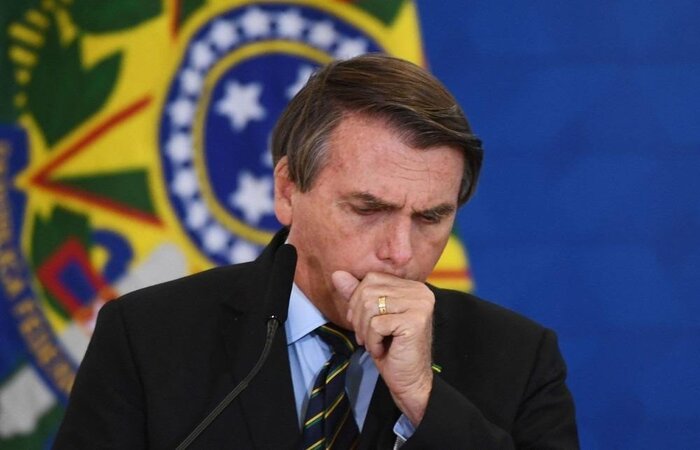 Presidente gravou vídeo ao lado do novo ministro da Defesa, Braga Netto, em uma entidade beneficente do Distrito Federal que faz distribuição de sopa para comunidades carentes/crédito: Evaristo Sá/AFP Presidente gravou vídeo ao lado do novo ministro da Defesa, Braga Netto, em uma entidade beneficente do Distrito Federal que faz distribuição de sopa para comunidades carentes/crédito: Evaristo Sá/AFP