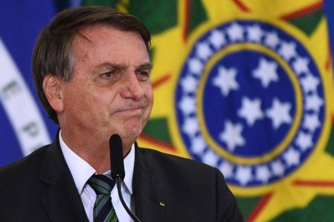Com a instalação da comissão, na próxima terça-feira, Bolsonaro entra em campo para tentar evitar desgastes ao governo/Foto: AFP Com a instalação da comissão, na próxima terça-feira, Bolsonaro entra em campo para tentar evitar desgastes ao governo/Foto: AFP