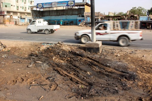 Local após a explosão criminosa do carro da jornalista Saber al-Haidar/Foto: Saleh Al-OBEIDI / AFP