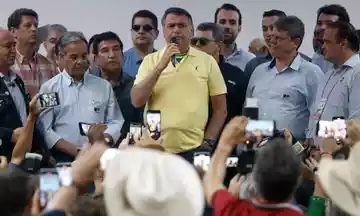 Jair Bolsonaro criticou as demarcações de terras indígenas feitas pelo governo Lula e fez aceno ao agronegócio. Ex-presidente foi ovacionado e chamado de mito/Foto: Miguel Schincariol/AFP