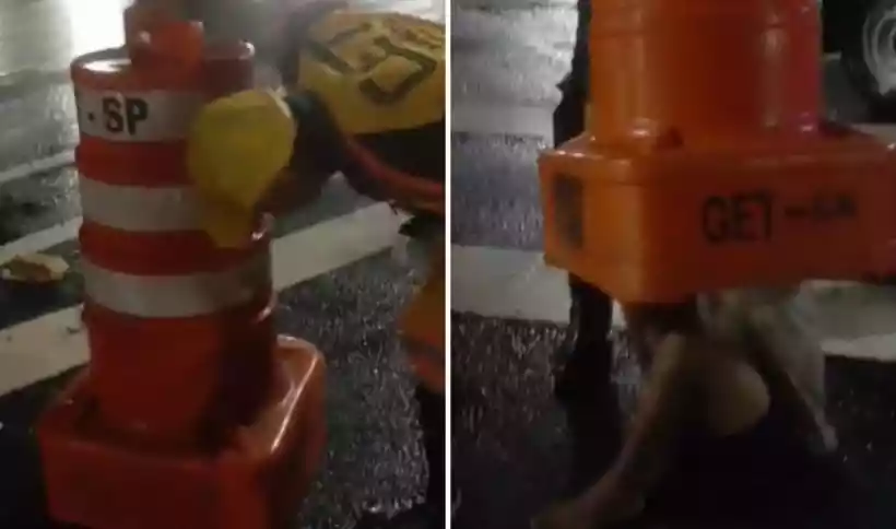 Homem tentou se esconder da chuva, mas acabou preso/Créditos: Reprodução / X