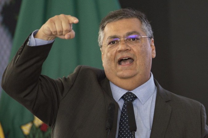 O ministro da Justiça, Flávio Dino, durante a apresentação de um balanço da segurança pública em 2023, em cerimônia no Palácio do Planalto/foto: Marcelo Camargo/Agência Brasil O ministro da Justiça, Flávio Dino, durante a apresentação de um balanço da segurança pública em 2023, em cerimônia no Palácio do Planalto/foto: Marcelo Camargo/Agência Brasil