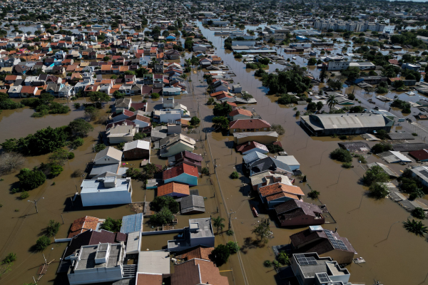 Vista aérea de uma área alagada de Canoas, município ao norte de Porto Alegre/Crédito: NELSON ALMEIDA / AFP Vista aérea de uma área alagada de Canoas, município ao norte de Porto Alegre/Crédito: NELSON ALMEIDA / AFP