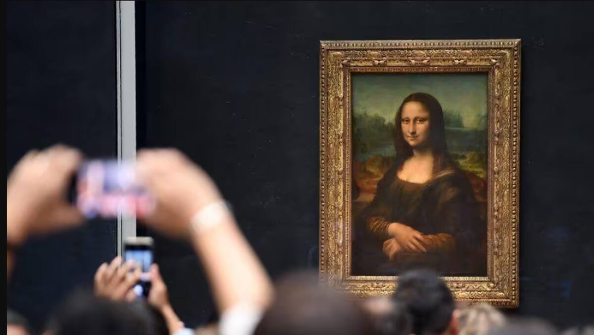 A obra-prima do artista italiano Leonardo da Vinci, também conhecida como Mona Lisa, exibida no Museu do Louvre/foto: Eric Feferberg / AFP A obra-prima do artista italiano Leonardo da Vinci, também conhecida como Mona Lisa, exibida no Museu do Louvre/foto: Eric Feferberg / AFP