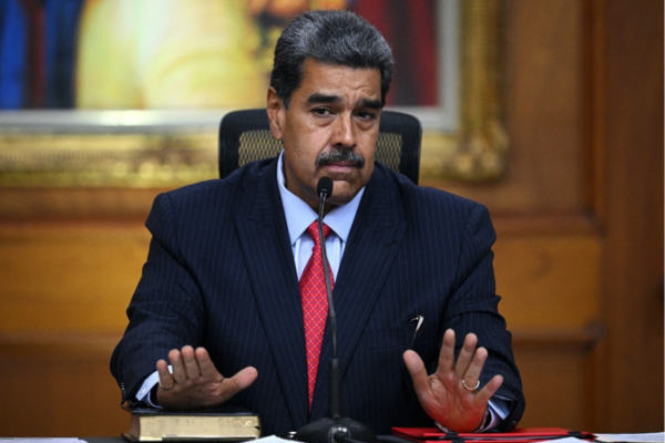 Maduro pôs a culpa do no atraso da divulgação dos resultados suposto ''ataque hacker''/Crédito: FEDERICO PARRA / AFP Maduro pôs a culpa do no atraso da divulgação dos resultados suposto ''ataque hacker''/Crédito: FEDERICO PARRA / AFP