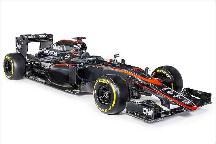 A McLaren deixou de lado o prateado para colorir o MP4-30 com um cinza escuro e detalhes em vermelho