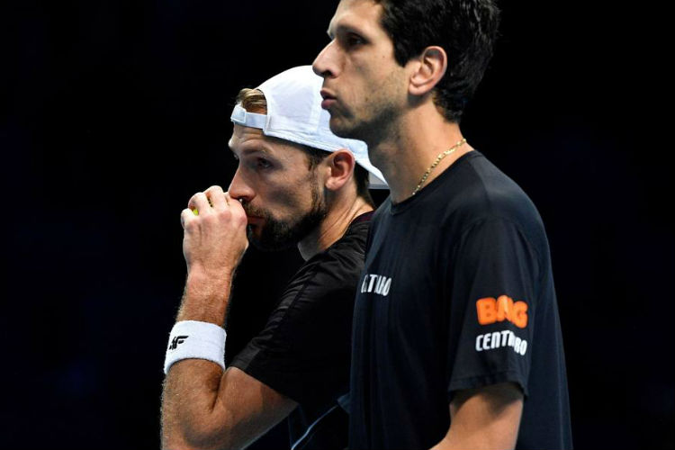 Marcelo Melo (direita) e Lukasz Kubot perderam na estreia em Roterdã