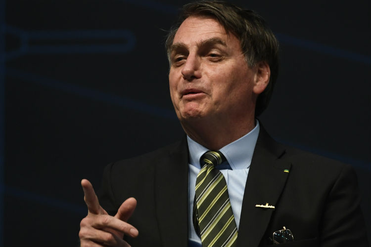 Presidente Jair Bolsonaro brincou com Felipe Melo, ausente do jogo por suspensão