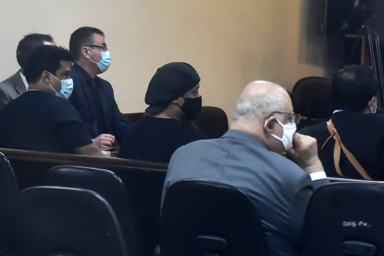 Ronaldinho e o irmão, Assis, durante audiência no Palácio da Justiça