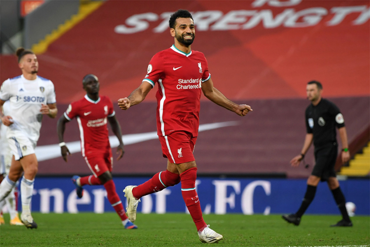 Salah em comemoração de um dos três gols marcados na estreia
